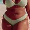 Braguita de bikini Cheekiest de pierna alta con ribete