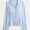 Camisa elástica de popelín con botones Camisa elástica de popelín con botones