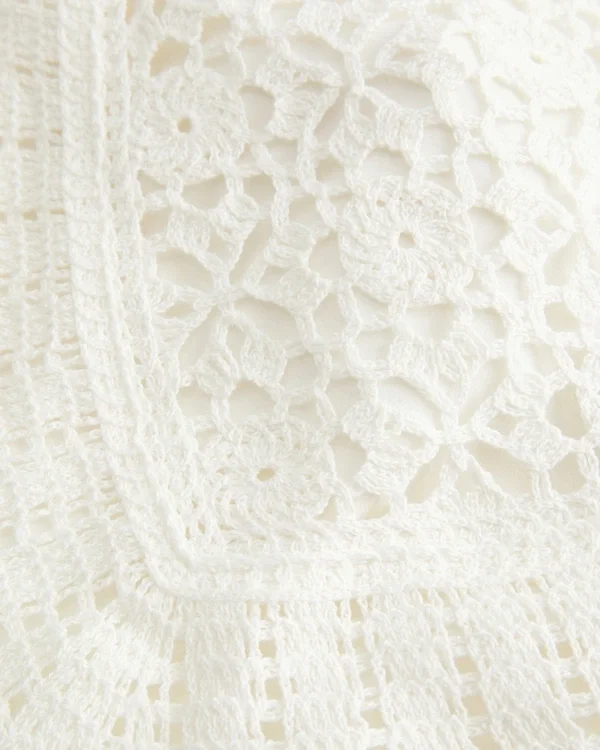 Camiseta de croché con cuello alto y espalda abierta Camiseta de croché con cuello alto y espalda abierta