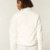 Chaqueta acolchada con estampado y cremallera