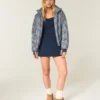 Chaqueta acolchada con estampado y cremallera