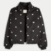 Chaqueta acolchada con estampado y cremallera