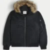 Chaqueta bomber con cremallera y ribete de piel sintética