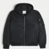 Chaqueta bomber con cremallera y ribete de piel sintética