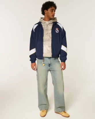 Chaqueta deportiva con estampado del Real Madrid CF y forro polar