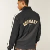 Chaqueta deportiva de felpa con gráfico de la Copa Mundial de la FIFA Alemania 2006 Chaqueta deportiva de felpa con gráfico de la Copa Mundial de la FIFA Alemania 2006