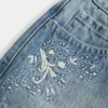 Falda pantalón micro mini de denim de talle ultra bajo Falda pantalón micro mini de denim de talle ultra bajo
