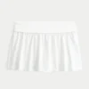 Falda pantalón mini de punto con vuelta