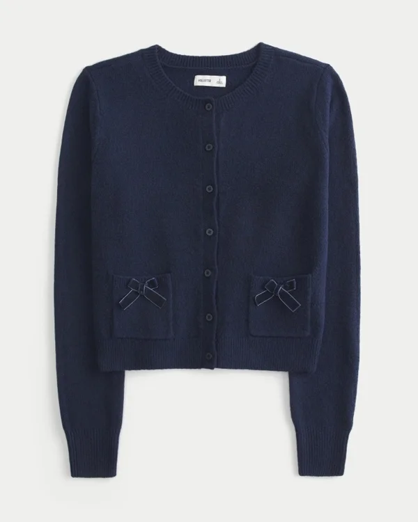 Hollister Cárdigan cómodo con bolsillos en forma de lazo Hollister Cárdigan cómodo con bolsillos en forma de lazo