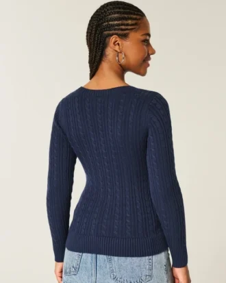 Jersey de cuello en V con diseño icónico de punto trenzado