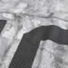 Jersey holgado con estampado de camuflaje Jersey holgado con estampado de camuflaje