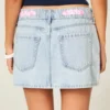 Mini falda pantalón vaquera con cintura baja y lazo Mini falda pantalón vaquera con cintura baja y lazo