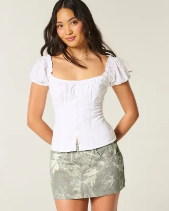 Minifalda pantalón de denim camuflaje de talle bajo y corte curvilíneo