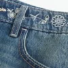 Minifalda pantalón vaquera bordada de talle bajo Minifalda pantalón vaquera bordada de talle bajo