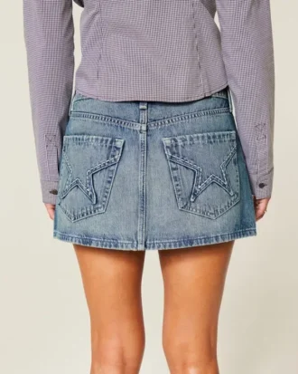 Minifalda pantalón vaquera con bolsillo bordado con estrella