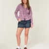 Minifalda pantalón vaquera de talle bajo y lavado oscuro
