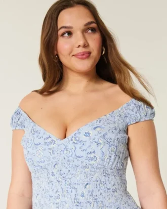 Minivestido asimétrico con hombros descubiertos Minivestido asimétrico con hombros descubiertos