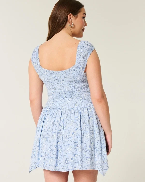 Minivestido asimétrico con hombros descubiertos Minivestido asimétrico con hombros descubiertos