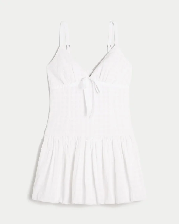 Minivestido con cuello en V y silueta abombada Minivestido con cuello en V y silueta abombada