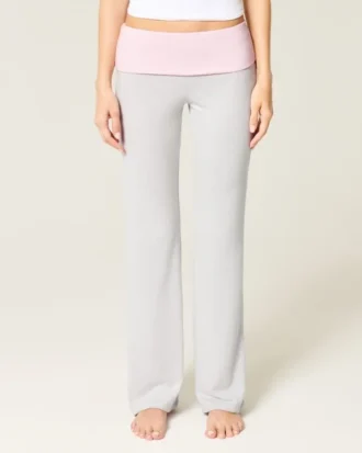 Pantalones acampanados de punto con cintura plegada