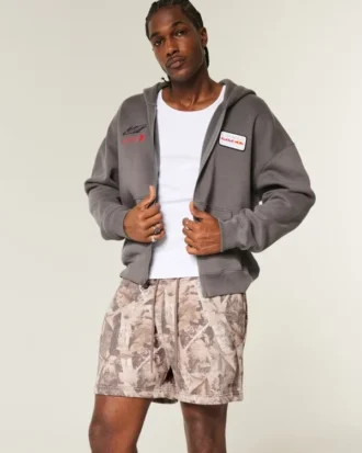 Pantalones cortos de felpa suelta con estampado de camuflaje hasta la mitad del muslo