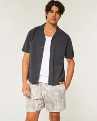 Pantalones cortos de felpa suelta con estampado de camuflaje hasta la mitad del muslo