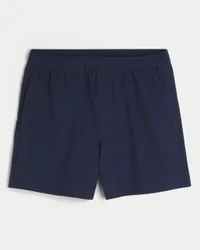 Pantalones cortos híbridos deportivos hasta la mitad del muslo