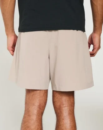 Pantalones cortos híbridos deportivos hasta la mitad del muslo