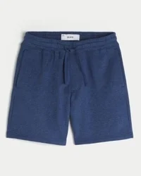 Pantalones cortos holgados de felpa por encima de la rodilla