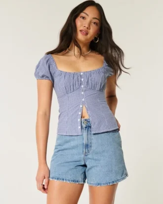 Pantalones cortos vaqueros holgados de talle alto y lavado medio 5″