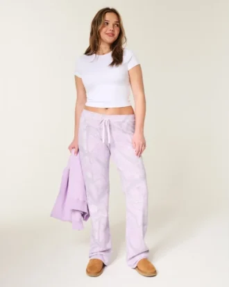 Pantalones de chándal acampanados con estampado de camuflaje