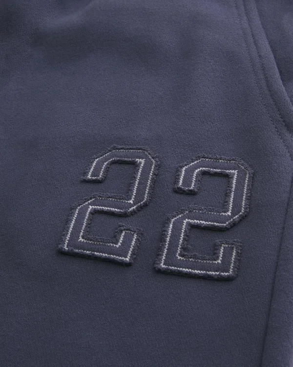 Pantalones de chándal bootcut con gráfico numérico Pantalones de chándal bootcut con gráfico numérico