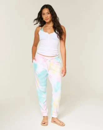 Pantalones de chándal de felpa con efecto lavado y logotipo gráfico Pantalones de chándal de felpa con efecto lavado y logotipo gráfico
