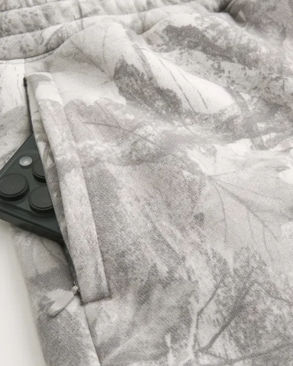 Pantalones de chándal de felpa con estampado de camuflaje Pantalones de chándal de felpa con estampado de camuflaje