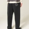 Pantalones de chándal holgados con bordado de araña Pantalones de chándal holgados con bordado de araña