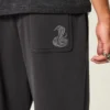 Pantalones de chándal holgados con estampado de serpiente Pantalones de chándal holgados con estampado de serpiente