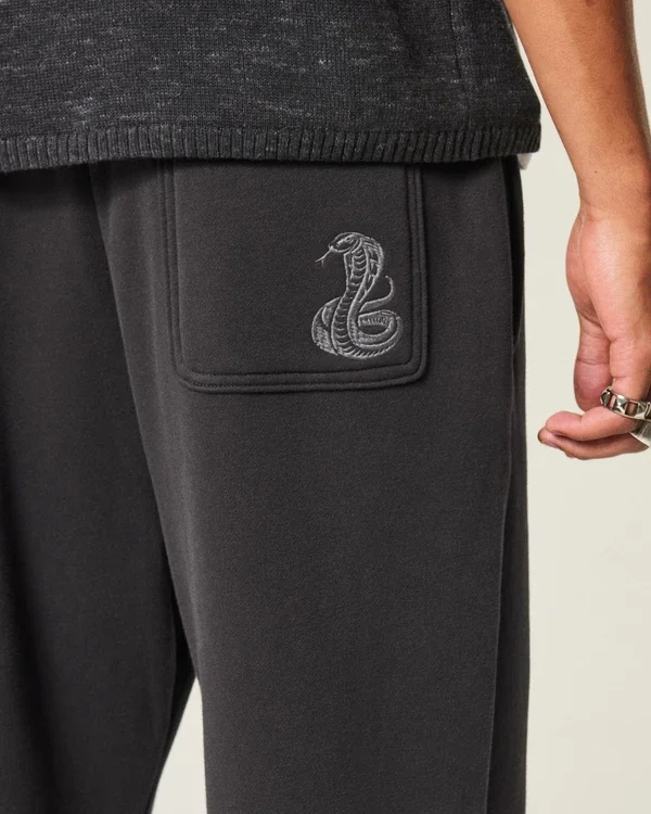 Pantalones de chándal holgados con estampado de serpiente Pantalones de chándal holgados con estampado de serpiente