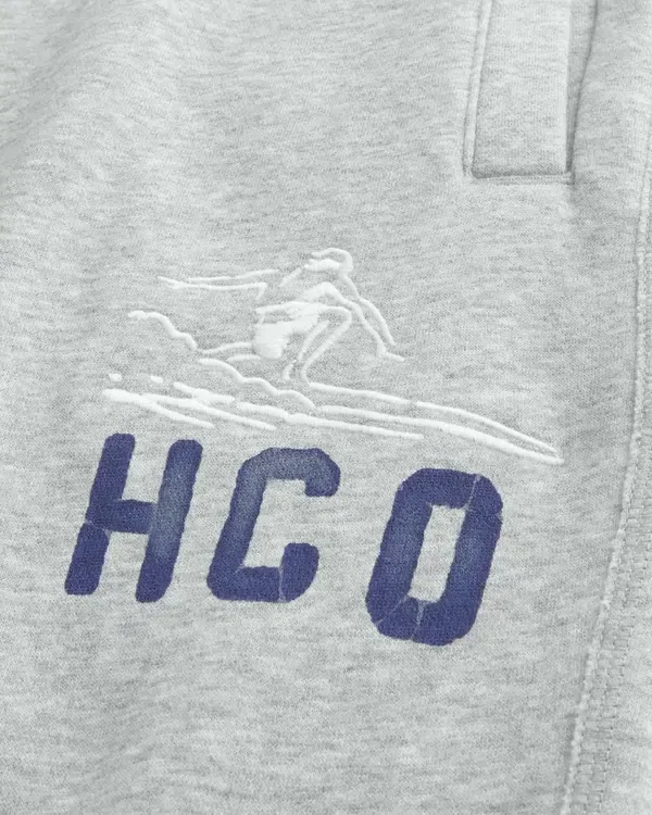 Pantalones de chándal holgados con gráfico del logotipo Holiday Vault Release Pantalones de chándal holgados con gráfico del logotipo Holiday Vault Release