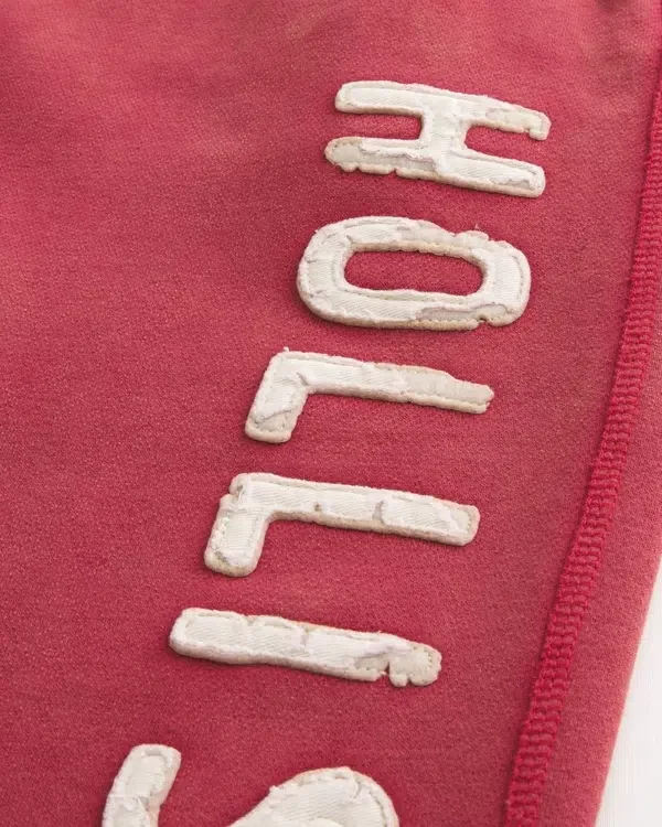 Pantalones de chándal holgados con gráfico del logotipo Holiday Vault Release Pantalones de chándal holgados con gráfico del logotipo Holiday Vault Release