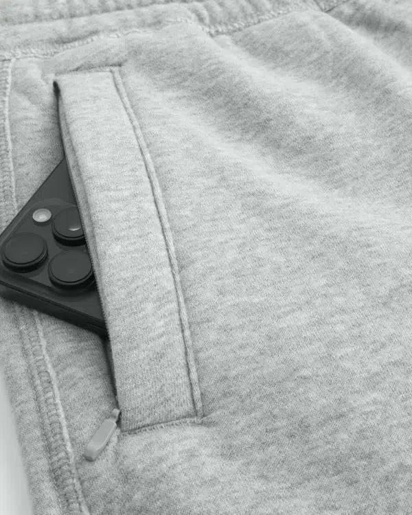 Pantalones de chándal holgados con gráfico del logotipo Holiday Vault Release Pantalones de chándal holgados con gráfico del logotipo Holiday Vault Release