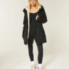 Parka con forro de piel sintética Parka con forro de piel sintética