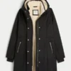 Parka con forro de piel sintética Parka con forro de piel sintética
