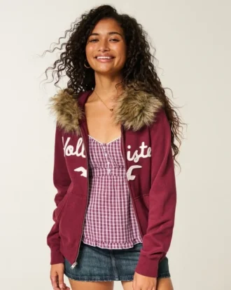 Sudadera con capucha, cremallera, ribete de pelo sintético y logotipo gráfico