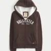 Sudadera con capucha, cremallera y logo gráfico, con forro de sherpa, de la colección Holiday Vault Sudadera con capucha, cremallera y logo gráfico, con forro de sherpa, de la colección Holiday Vault