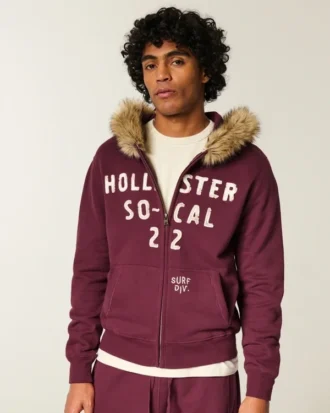 Sudadera con capucha, cremallera y logotipo gráfico con ribete de piel sintética Sudadera con capucha, cremallera y logotipo gráfico con ribete de piel sintética