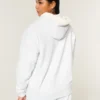 Sudadera con capucha reversible con forro de piel sintética y cremallera Sudadera con capucha reversible con forro de piel sintética y cremallera