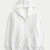 Sudadera con capucha reversible con forro de piel sintética y cremallera Sudadera con capucha reversible con forro de piel sintética y cremallera