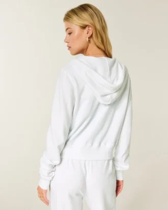 Sudadera con capucha y cremallera de felpa