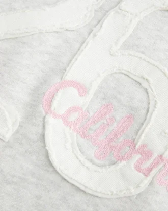 Sudadera con capucha y estampado gráfico con forro de piel sintética