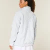 Sudadera con cremallera de un cuarto y bordado de lazo de Gilly Hicks